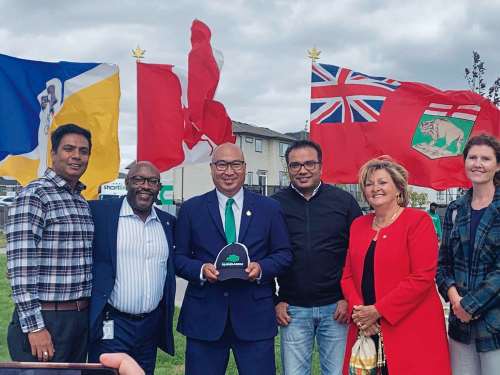 Supplied photo 
Waverley MLA Jon Reyes (centre) was joined by (from far left) Paramjit Shahi, president of South Winnipeg Community Centre; Coun. Markus Chambers (St. Norbert-Seine River); ; community member Amit Bindra; Coun. Janice Lukes (Waverley West); and Pembina Trails school trustee Julie Fisher at the announcement of the South Winnipeg recreation campus.