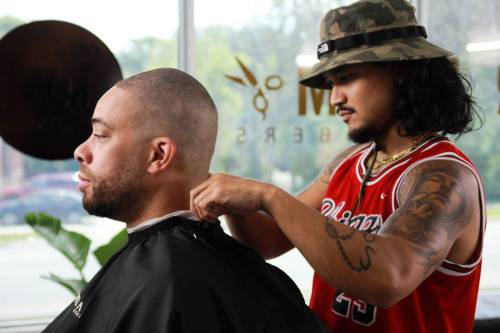 Mark Antonio (right) co-owns the Dream Barbershop, a Silver Heights business that shares a building with Dream Bootcamp, a gym owned by his business partner and fellow West End native Lendyll Soriano. The Dream Barbershop and Dream Bootcamp recently welcomed a pop-up version of the Exchange District store, The Collab Shop, under its roof.