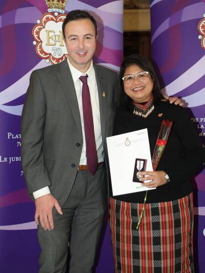 Supplied photo
                                St. James MLA Adrien Sala is pictured with Araceli Ancheta, a Platinum Jubilee medal recipient from his constituency.