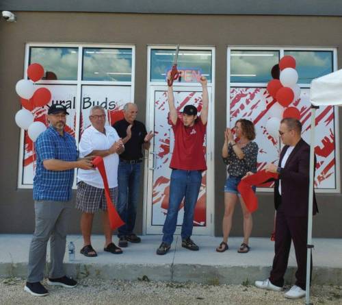 Supplied photo
                                Stacie Rasmussen (second from right) and others celebrated the opening of Rural Buds in St. Adolphe in July 2022.