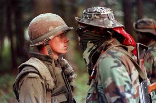 Shaney Komulainen / THE CANADIAN PRESS files 
A Canadian solider and First Nations protester face off at the Kahnesatake reserve in Oka, Que., in September 1990.