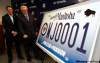 KEN GIGLIOTTI /  WINNIPEG FREE PRESS
Winnipeg Jets licence plates were unveiled Tuesday at the MTS Centre by Mark Chipman (left) and Premier Greg Selinger.