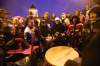 TREVOR HAGAN / WINNIPEG FREE PRESS Archives
People huddle in the rain as drummers play at a vigil for missing and murdered women at the legislative building in early October.