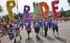 Mike Deal / Winnipeg Free Press
Participants in the Pride Parade walk along Memorial Boulevard in front of the Manitoba Legislative Building Sunday afternoon.