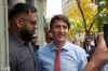RYAN THORPE / WINNIPEG FREE PRESS
Liberal leader Justin Trudeau with Shawarma Khan owner Obby Khan on Arthur Street in Old Market Square in Downtown Winnipeg Thursday.