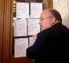 Kristin Annable / Winnipeg Free Press
An angry Russ Wyatt tapes his 20 rejected amendments to the pedestrian-and-cycling strategy on Mayor Brian Bowman's door Wednesday.