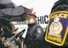 WAYNE.GLOWACKI@FREEPRESS.MB.CA
Insp. Brian Cyncora speaks outside the police mobile command unit on Selkirk Avenue.