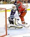 rick havner / the associated press
Jets goalie David Aebischer watches a shot by Carolina Hurricanes' Jussi Jokinen slide past the net Sunday.