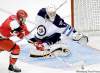RICK HAVNER / THE ASSOCIATED PRESS 
Carolina Hurricanes’ Jon Matsumoto tries but fails to get a shot past Winnipeg Jets goalie David Aebischer during the third period Sunday.