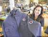 WAYNE GLOWACKI/WINNIPEG FREE PRESS Julie Land with a jacket her Pine Falls Clothing firm makes that is sold exclusively at the Jets Gear store.
