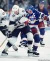 Phil Hossack / Winnipeg Free Press archives Troy Murray, seen checking Jari Kurri in 1992, wishes the game against Chicago was in Winnipeg.