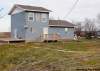 PHOTOS BY KEN GIGLIOTTI / WINNIPEG FREE PRESS
Police tape surrounds the house and yard where the nine-year-old boy was shot.