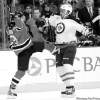 CP
Bill Kostroun / the associated pressNew Jersey Devil David Clarkson surrenders after being walloped off-balance by Jets blue-liner Dustin Byfuglien on Saturday night.