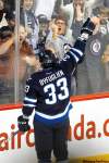 John Woods / the canadian press
Thank you, thank you. Jets defenceman Dustin Byfuglien plays to the fans after scoring on a clever bank shot in the first period Friday night at the MTS Centre.