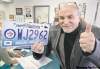 JOE BRYKSA / WINNIPEG FREE PRESS 
Sal Garofoli was one of the first customers to pick up his Jets plate at his Autopac agent's office.