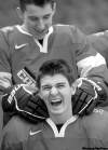 Nathan Denette / the canadian press
Team Canada's Ryan Strome (top) pretends to choke teammate Mark Scheifele at a photo session in Calgary on Wednesday.