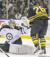 CP
Jets� goalie Ondrej Pavelec snares the puck before Buffalo Sabres� Thomas Vanek can pounce. Pavelec stopped 31 of 32 shots Saturday night.