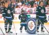 Ashton takes his spot during the national anthem beside Jets  Antti Miettinen and Tanner Glass.