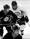 JOE BRYKSA / WINNIPEG FREE PRESS ARCHIVESJets blue-liner Dustin Byfuglien (rear) misses the dressing-room fun.