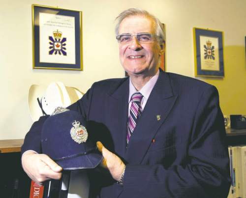 WAYNE GLOWACKI / WINNIPEG FREE PRESS 
Graham Starmer with his  bobby's hat. The Manitoba Chambers of Commerce president spent the first 27 years of his working life as a police officer and spy catcher in England and Canada.