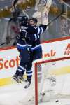 John Woods / The Canadian Press
Winnipeg Jets rookie Scott Kosmachuk celebrates Adam Lowry&rsquo;s game-winning goal in the third period Saturday night.