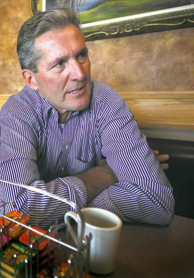 PHOTOS BY PHIL HOSSACK/WINNIPEG FREE PRESS
Brian Pallister talks politics after a mid-morning coffee break in his Portage la Prairie constituency.