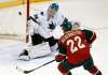 Jim Mone / Associated Press files
Minnesota Wild's Nino Niederreiter, right, of Switzerland, positions himself for a rebound as San Jose Sharks goalie James Reimer stops a shot in the first period.