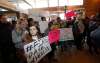 Wayne Glowacki / Winnipeg Free Press
Approximately 50 protesters stand outside the doors of CITI FM Tuesday in the Osborne Village calling for host Dave Wheeler’s termination in response to racist and sexist videos posted on the radio station’s website.