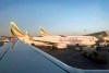 This photo taken Monday, Feb. 11, 2019 shows an Ethiopian Airlines Boeing 737-800 parked at Bole International Airport in Addis Ababa, Ethiopia. An Ethiopian Airlines Boeing 737 Max 8 jetliner carrying 157 people crashed shortly after takeoff from the Ethiopian capital Sunday, March 10, 2019 killing everyone aboard, authorities said. (AP Photo/Ben Curtis)