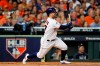 Houston Astros' Jose Altuve hits a double against the New York Yankees during the first inning in Game 6 of baseball's American League Championship Series Saturday, Oct. 19, 2019, in Houston.(AP Photo/Matt Slocum)