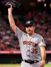 Houston Astros starting pitcher Justin Verlander waves to fans as he walks back to the dugout after striking out Los Angeles Angels' Kole Calhoun for his 3,000th career strikeout during the fourth inning of a baseball game Saturday, Sept. 28, 2019, in Anaheim, Calif. (AP Photo/Mark J. Terrill)