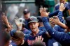 Minnesota Twins' Max Kepler, center, celebrates his two-run home run with teammates in the dugout during the seventh inning of the team's baseball game against the Los Angeles Angels on Thursday, May 23, 2019, in Anaheim, Calif. (AP Photo/Marcio Jose Sanchez)