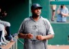 New York Yankees starting pitcher CC Sabathia walks through the dugout in the second inning of a baseball game against the Texas Rangers in Arlington, Texas, Sunday, Sept. 29, 2019. (AP Photo/Tony Gutierrez)