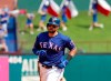 Texas Rangers' Joey Gallo rounds the bases after hitting a two-run home run off of Kansas City Royals' Homer Bailey in the fourth inning of a baseball game in Arlington, Texas, Saturday, June 1, 2019. The shot also scored Hunter Pence. (AP Photo/Tony Gutierrez)