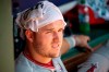 Los Angeles Angels' Mike Trout cools off in the dugout during the third inning of the first baseball game of a doubleheader against the Texas Rangers Tuesday, Aug. 20, 2019, in Arlington, Texas. Los Angeles won 5-1 as temperatures topped 100 degrees Fahrenheit. (AP Photo/Jeffrey McWhorter)