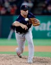 Boston Red Sox's Ryan Brasier works against the Texas Rangers during the seventh inning of a baseball game in Arlington, Texas, Wednesday, Sept. 25, 2019. (AP Photo/Tony Gutierrez)
