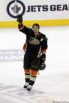 Mike Deal / Winnipeg Free Press
The Anaheim Ducks' Teemu Selanne (8) comes back onto the ice and acknowledges his Winnipeg fans after being selected third star of the game against the Jets at the MTS Centre on Saturday night.