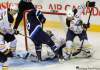 Phil Hossack / Winnipeg Free Press
Buffalo captain Jason Pominville recovers a rebound after the Winnipeg Jets' Tanner Glass (15) tried to put one behind Sabres goalie Ryan Miller in first-period action Thursday at the MTS Centre.