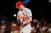 St. Louis Cardinals starting pitcher Jack Flaherty flips the ball between hitters against the Arizona Diamondbacks during the sixth inning of a baseball game, Tuesday, Sept. 24, 2019, in Phoenix. (AP Photo/Matt York)