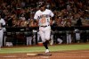 Arizona Diamondbacks' Eduardo Escobar (5) scores on a bases-loaded walk issued by the San Francisco Giants during the sixth inning of a baseball game Friday, Aug. 16, 2019, in Phoenix. (AP Photo/Matt York)