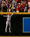 Colorado Rockies left fielder David Dahl can not catch a two-run home run hit by Arizona Diamondbacks' Jake Lamb during the sixth inning of a baseball game Saturday, July 6, 2019, in Phoenix. (AP Photo/Rick Scuteri)