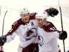 CP
Colorado Avalanche center Nathan MacKinnon (29) congratulates left wing J.T. Compher (37) after Compher scored a goal during the third period of an NHL hockey game against the Florida Panthers, Thursday, Dec. 6, 2018 in Sunrise, Fla. (AP Photo/Wilfredo Lee)