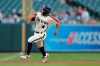 Houston Astros' Jose Altuve runs the bases before scoring on a hit by Alex Bregman during the first inning of a baseball game against the Baltimore Orioles, Friday, Aug. 9, 2019, in Baltimore. (AP Photo/Julio Cortez)