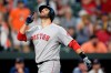 Boston Red Sox's J.D. Martinez celebrates his two-run home run during the fourth inning of a baseball game against the Baltimore Orioles, Friday, June 14, 2019, in Baltimore. (AP Photo/Nick Wass)