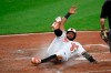 Baltimore Orioles' Hanser Alberto slides home to score a run on a single by Dwight Smith Jr. during the fourth inning of a baseball game against the New York Yankees, Monday, May 20, 2019, in Baltimore. (AP Photo/Nick Wass)