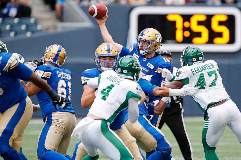 THE CANADIAN PRESS/John Woods
Winnipeg Blue Bombers quarterback Matt Nichols gets a pass away with pressure from Saskatchewan Roughriders' defence. Nichols has just one interception in his last three games.