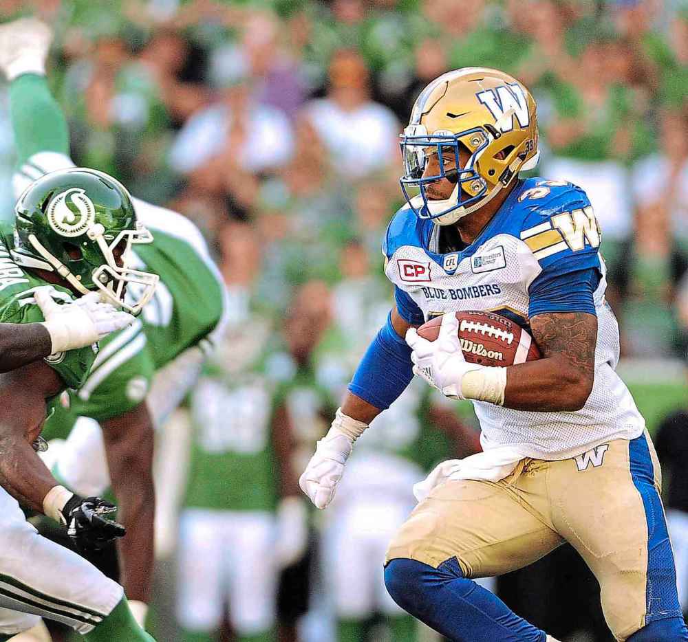 THE CANADIAN PRESS/Mark Taylor
Winnipeg Blue Bombers running back Andrew Harris works his way upfield against the Saskatchewan Roughriders. This weekend's playoff match between the prairie rivals might be the Bombers' best opportunity at winning a Grey Cup in the last 45 years.