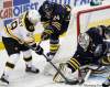 Derek Gee / The Associated Press Archives
Boston Bruins' Rich Peverley (49) tries to jam the puck past Buffalo Sabres goalie Jhonas Enroth (1), Wednesday. Peverley faces some former Thrashers teammates tonight when the Bruins play the Winnipeg Jets.