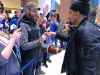 Danielle DeSilva / Winnipeg Free Press
Winnipeg Blue Bombers running back Andrew Harris signs a football for a fan at James Richardson International Airport on Monday.