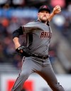 Arizona Diamondbacks pitcher Alex Young works against the San Francisco Giants in the first inning of a baseball game Thursday, June 27, 2019, in San Francisco. (AP Photo/Ben Margot)